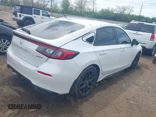 2023 Honda Civic Sport with VIN 19XFL2H80PE022752, listed as a IAAI auction lot 42077694 with 25,939 mi miles and . Bid and sale history available at DreamBid. Image 4.