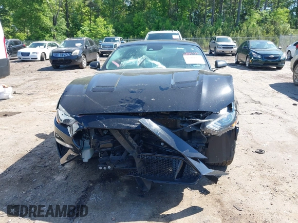 2021 Ford Mustang GT z VIN 1FA6P8CFXM5156002, wystawiony jako IAAI lot #42009222 z przebiegiem 65 939 mil mil oraz . Historia ofert i sprzedaży dostępna na DreamBid. Obrazek 12.