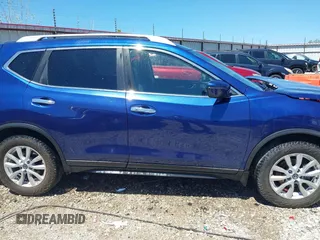 2019 Nissan Rogue SV with VIN 5N1AT2MT0KC705437, listed as a IAAI auction lot 42060597 with 98,555 mi miles and . Bid and sale history available at DreamBid. Image 14.