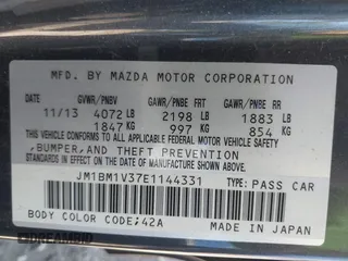 2014 Mazda 3 S Touring with VIN JM1BM1V37E1144331, listed as a IAAI auction lot 41880673 with 102,963 mi miles and . Bid and sale history available at DreamBid. Image 9.
