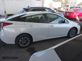 2019 Toyota Prius L Eco with VIN JTDKARFU8K3102331, listed as a IAAI auction lot 41852084 with 54,275 mi miles. Bid and sale history available at carsss.com. Image 13.