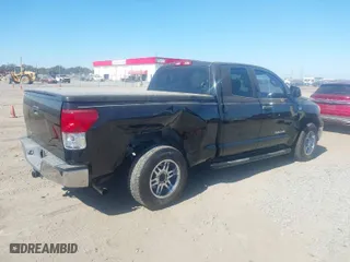 2010 Toyota Tundra 2WD Truck with VIN 5TFRM5F10AX010142, listed as a IAAI auction lot 40586543 with 280,387 mi miles. Bid and sale history available at carsss.com. Image 4.