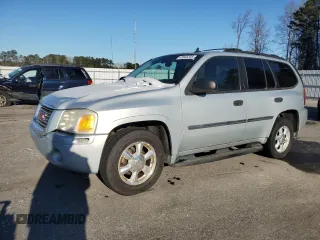 2007 GMC Envoy SLE with VIN 1GKDT13SX72142175, listed as a Copart auction lot 45945305 with 169,048 mi miles and Salvage Title. Bid and sale history available at carsss.com. Image 1.