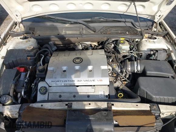 2002 Cadillac DeVille z VIN 1G6KD54Y72U218221, wystawiony jako IAAI lot #41842554 z przebiegiem 117 430 mil mil oraz . Historia ofert i sprzedaży dostępna na DreamBid. Obrazek 10.