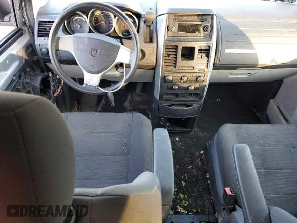 2009 Dodge Caravan z VIN 208HN44EX9R651559, wystawiony jako Copart lot #45508355 z przebiegiem 127 852 mil mil oraz Nie do naprawy • Non repairable. Historia ofert i sprzedaży dostępna na DreamBid. Obrazek 8.