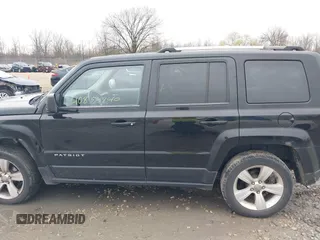 2014 Jeep Patriot Limited with VIN 1C4NJRCB7ED569805, listed as a IAAI auction lot 40854840 with 189,858 mi miles. Bid and sale history available at carsss.com. Image 14.