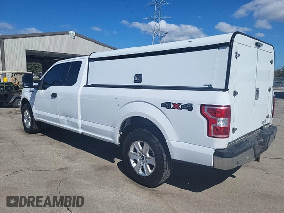 2019 Ford F-150 XL with VIN 1FTFX1E40KKE10523, listed as a IAAI auction lot 42240388 with 114,046 mi miles and . Bid and sale history available at DreamBid. Image 1.