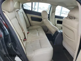 2014 Lincoln MKS EcoBoost z VIN 1LNHL9FT5EG601141, wystawiony jako Copart lot #86497854 z przebiegiem 136 915 mil mil oraz Szkoda całkowita • Salvage title. Historia ofert i sprzedaży dostępna na DreamBid. Obrazek 10.