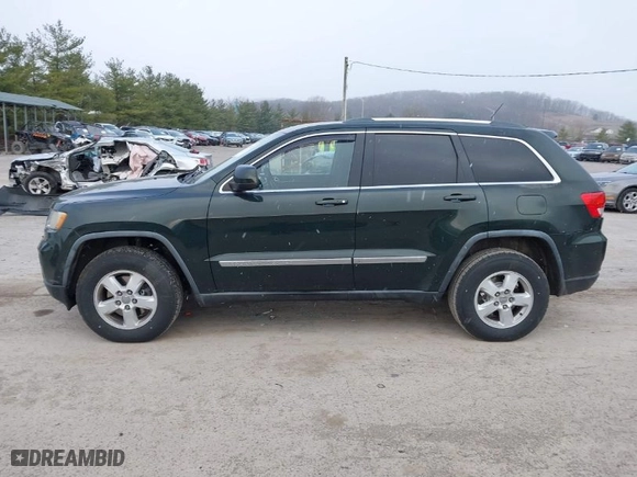 2011 Jeep Grand Cherokee Laredo with VIN 1J4RR4GG9BC546198, listed as a IAAI auction lot 41879387 with 190,973 mi miles. Bid and sale history available at carsss.com. Image 14.