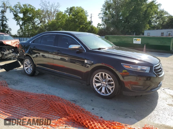 2017 Ford Taurus Limited with VIN 1FAHP2F84HG111702, listed as a Copart auction lot 54694325 with 114,533 mi miles and Salvage Title. Bid and sale history available at DreamBid. Image 4.