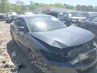 2016 Nissan Maxima SV z VIN 1N4AA6AP0GC376793, wystawiony jako IAAI lot #42030401 z przebiegiem 69 696 mil mil oraz . Historia ofert i sprzedaży dostępna na DreamBid. Obrazek 1.