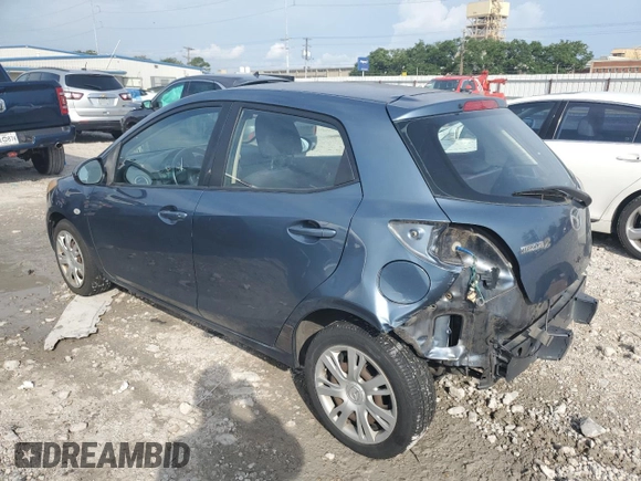 2014 Mazda 2 Sport z VIN JM1DE1KY0E0177473, wystawiony jako Copart lot #60984055 z przebiegiem 88 202 mil mil oraz Szkoda całkowita • Salvage title. Historia ofert i sprzedaży dostępna na DreamBid. Obrazek 2.