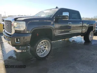 2016 GMC Sierra 2500HD Denali with VIN 1GT12UE82GF211051, listed as a Copart auction lot 52284815 with 249,076 mi miles and Salvage title. Bid and sale history available at DreamBid. Image 1.