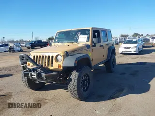 2013 Jeep Wrangler Unlimited Rubicon with VIN 1C4BJWFG3DL632668, listed as a IAAI auction lot 41751546 with 153,149 mi miles. Bid and sale history available at carsss.com. Image 16.