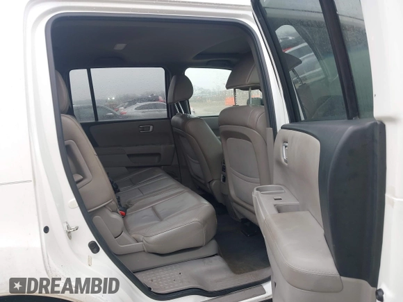 2013 Honda Pilot EX-L with VIN 5FNYF3H52DB014959, listed as a IAAI auction lot 41459164 with 174,136 mi miles and . Bid and sale history available at DreamBid. Image 8.