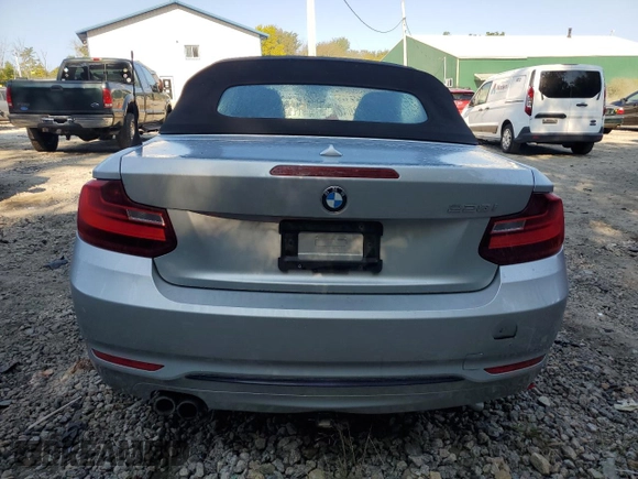 2016 BMW 2 Series 228i with VIN WBA1K9C52GV321963, listed as a Copart auction lot 71393424 with 118,029 mi miles and Salvage Title. Bid and sale history available at carsss.com. Image 6.
