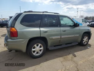 2003 GMC Envoy SLT with VIN 1GKDT13S032112192, listed as a Copart auction lot 54351985 with 297,007 mi miles and Clean Title. Bid and sale history available at carsss.com. Image 3.