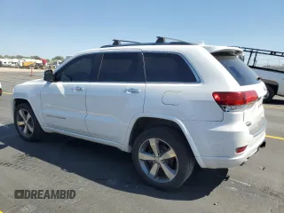 2015 Jeep Grand Cherokee Overland with VIN 1C4RJFCM4FC618516, listed as a Copart auction lot 58671455 with 221,550 mi miles and Clean title. Bid and sale history available at DreamBid. Image 2.