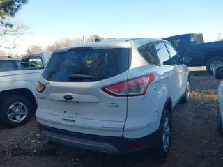 2013 Ford Escape SE with VIN 1FMCU9GX0DUD93680, listed as a IAAI auction lot 41792386 with 262,671 mi miles and . Bid and sale history available at DreamBid. Image 4.