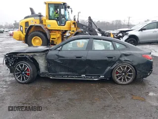 2024 BMW i4 M50 z VIN WBY33AW00RFS06591, wystawiony jako IAAI lot #41863252 z przebiegiem 15 260 mil mil oraz . Historia ofert i sprzedaży dostępna na DreamBid. Obrazek 14.