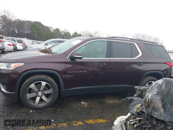 2019 Chevrolet Traverse LT z VIN 1GNERHKW8KJ117969, wystawiony jako IAAI lot #41619931 z przebiegiem 64 767 mil mil oraz . Historia ofert i sprzedaży dostępna na DreamBid. Obrazek 14.