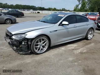 2015 BMW 6 Series 650i with VIN WBA6B2C58FGB99581, listed as a Copart auction lot 71403354 with 89,545 mi miles and Salvage Title. Bid and sale history available at carsss.com. Image 1.