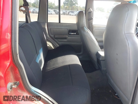 1996 Jeep Cherokee Sport with VIN 1J4FT68S4TL326973, listed as a IAAI auction lot 42744791 with 215,905 mi miles and . Bid and sale history available at DreamBid. Image 8.