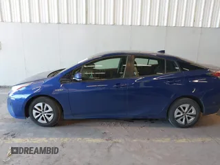 2017 Toyota Prius Two z VIN JTDKARFU3H3538478, wystawiony jako IAAI lot #42109823 z przebiegiem 74 567 mil mil oraz . Historia ofert i sprzedaży dostępna na DreamBid. Obrazek 14.