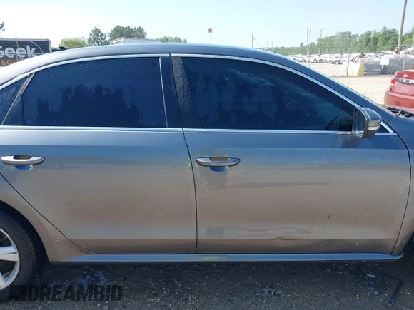 2015 Volkswagen Passat 1.8T Wolfsburg Ed with VIN 1VWAT7A3XFC115934, listed as a IAAI auction lot 41948035 with 243,143 mi miles. Bid and sale history available at carsss.com. Image 14.