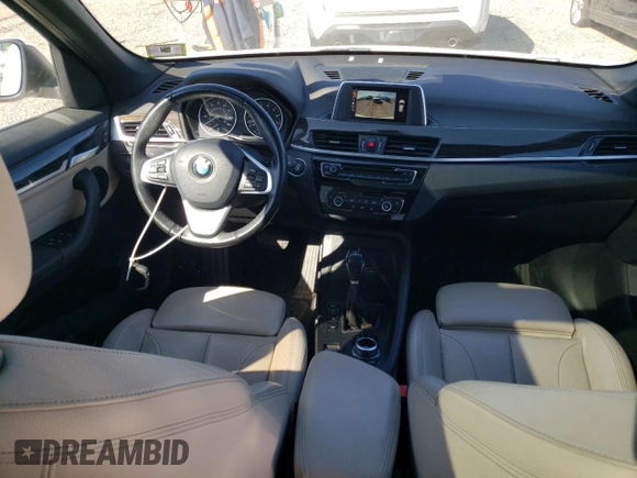 2017 BMW X1 xDrive28i with VIN WBXHT3C31H5F82700, listed as a Copart auction lot 48051095 with 76,861 mi miles and Salvage Title. Bid and sale history available at carsss.com. Image 8.