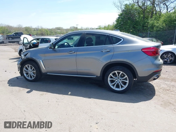 2016 BMW X6 xDrive35i with VIN 5UXKU2C53G0N84273, listed as a IAAI auction lot 42104112 with 61,183 mi miles and . Bid and sale history available at DreamBid. Image 3.