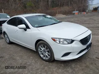 2016 Mazda Mazda6 i Sport with VIN JM1GJ1U53G1451550, listed as a IAAI auction lot 41868979 with 63,927 mi miles. Bid and sale history available at carsss.com. Image 1.