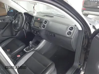 2011 Volkswagen Tiguan SE with VIN WVGAV7AX1BW549681, listed as a IAAI auction lot 40772939 with 157,547 mi miles and . Bid and sale history available at DreamBid. Image 5.