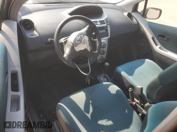 2008 Toyota Yaris with VIN JTDJT923285215823, listed as a Copart auction lot 53257895 with 184,400 mi miles and Salvage Title. Bid and sale history available at carsss.com. Image 8.