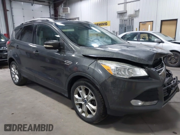 2016 Ford Escape Titanium with VIN 1FMCU9J90GUB35593, listed as a IAAI auction lot 42309020 with 173,019 mi miles and . Bid and sale history available at DreamBid. Image 1.