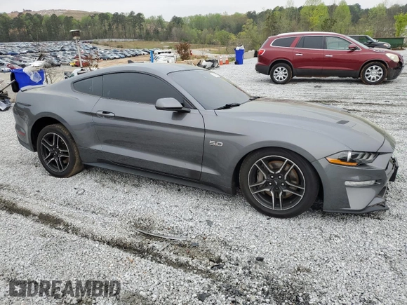 2021 Ford Mustang GT with VIN 1FA6P8CF5M5123683, listed as a Copart auction lot 50895515 with 83,245 mi miles and Salvage title. Bid and sale history available at DreamBid. Image 4.