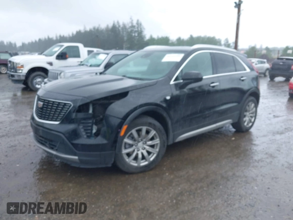 2020 Cadillac XT4 AWD Premium Luxury z VIN 1GYFZDR45LF049638, wystawiony jako IAAI lot #42216996 z przebiegiem 82 760 mil mil oraz . Historia ofert i sprzedaży dostępna na DreamBid. Obrazek 2.