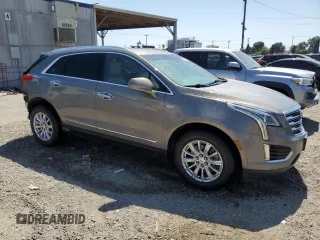 2017 Cadillac XT5 FWD with VIN 1GYKNARS1HZ265368, listed as a Copart auction lot 55365855 with 108,176 mi miles and Salvage title. Bid and sale history available at DreamBid. Image 4.
