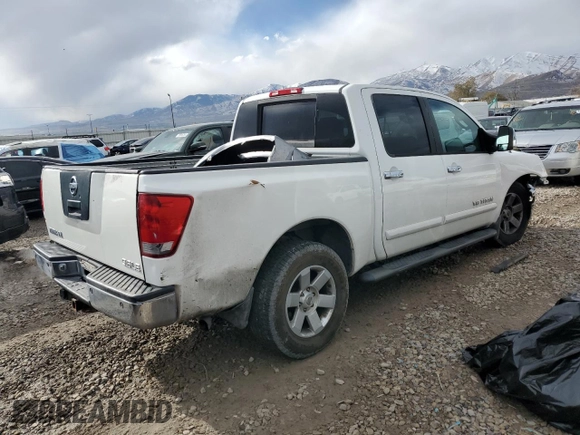 2005 Nissan Titan SE with VIN 1N6AA07B65N566549, listed as a Copart auction lot 80915034 with 268,827 mi miles and Salvage Title. Bid and sale history available at carsss.com. Image 3.