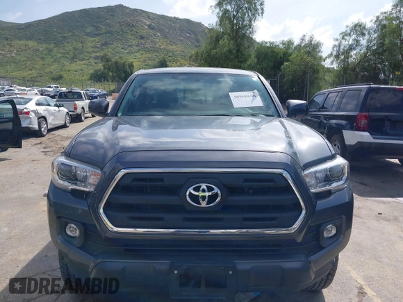 2017 Toyota Tacoma SR5 with VIN 3TMAZ5CN6HM050456, listed as a IAAI auction lot 38968606 with 48,576 mi miles and . Bid and sale history available at DreamBid. Image 13.