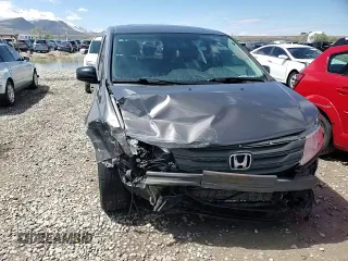 2012 Honda Odyssey Touring with VIN 5FNRL5H97CB070213, listed as a Copart auction lot 53558715 with 218,964 mi miles and Salvage title. Bid and sale history available at DreamBid. Image 14.