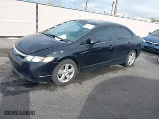 2007 Honda Civic Sdn EX with VIN 1HGFA16887L057776, listed as a IAAI auction lot 41901128 with 261,299 mi miles. Bid and sale history available at carsss.com. Image 2.