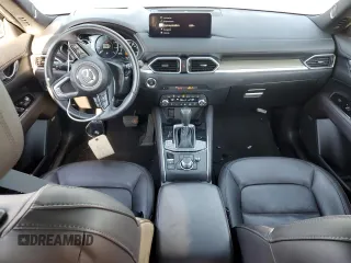 2021 Mazda CX-5 Signature with VIN JM3KFBEY5M0447759, listed as a Copart auction lot 42565535 with 24,175 mi miles and Salvage Title. Bid and sale history available at carsss.com. Image 8.