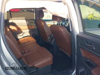 2023 Volkswagen Atlas SE with VIN 1V2HR2CA6PC523233, listed as a IAAI auction lot 41952399 with 28,387 mi miles and . Bid and sale history available at DreamBid. Image 8.
