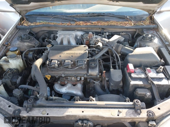 1998 Toyota Camry LE z VIN 4T1BF28K4WU057663, wystawiony jako IAAI lot #41329614 z przebiegiem 145 034 mil mil oraz . Historia ofert i sprzedaży dostępna na DreamBid. Obrazek 10.