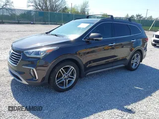 2017 Hyundai Santa Fe SE Ultimate z VIN KM8SR4HFXHU231793, wystawiony jako IAAI lot #41963670 z przebiegiem 132 658 mil mil oraz . Historia ofert i sprzedaży dostępna na DreamBid. Obrazek 2.