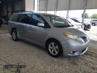 2015 Toyota Sienna LE AAS with VIN 5TDKK3DC5FS663627, listed as a Copart auction lot 59930455 with 125,858 mi miles and Salvage title. Bid and sale history available at DreamBid. Image 4.
