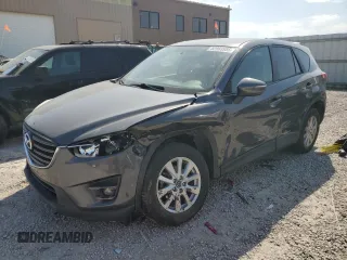 2016 Mazda CX-5 Touring с VIN JM3KE4CY2G0667401, выставлен на аукционе Copart как лот 52983955 с пробегом 153 964 миль миль и Списание • Salvage title. История ставок и продаж доступна на DreamBid. Изображение 1.