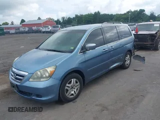 2005 Honda Odyssey EX with VIN 5FNRL38435B101887, listed as a IAAI auction lot 42704893 with 185,137 mi miles and . Bid and sale history available at DreamBid. Image 2.