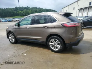 2019 Ford Edge SEL с VIN 2FMPK3J99KBC40023, выставлен на аукционе Copart как лот 61362885 с пробегом 120 508 миль миль и Чистый • Clean title. История ставок и продаж доступна на DreamBid. Изображение 2.